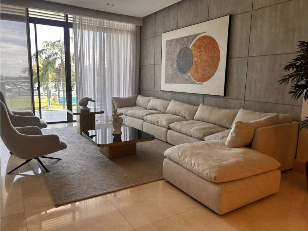 Modern furnished open dining and lounge space with marina views at PH Garden Ocean Reef Panama
