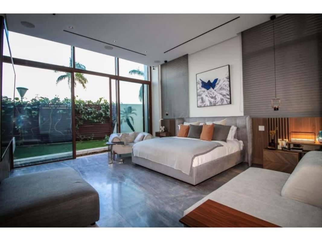 Elegant master bedroom with balcony and marina views Ocean Reef Islands Panama City