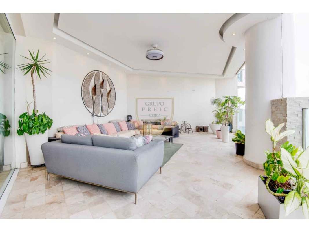 Modern luxury dining area with ocean views marble flooring chandelier at Venetian Tower Punta Pacífica Panama