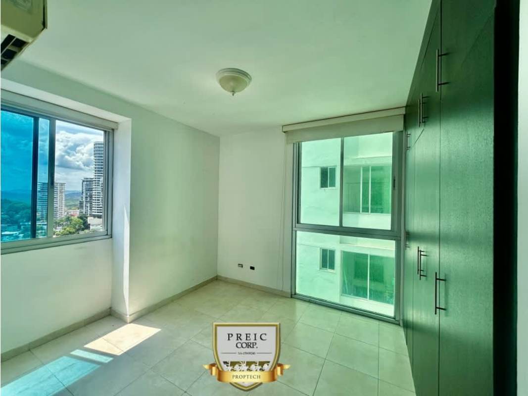 Dining space adjacent to large windows with sky and ocean view at Seawaves Bella Vista Panama City
