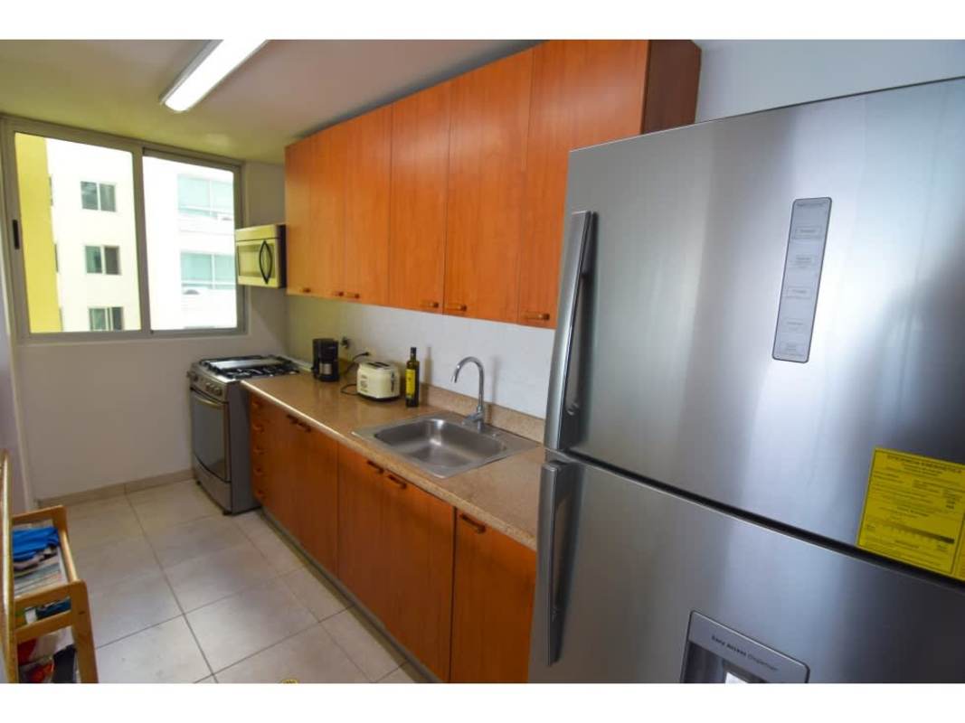 Fully equipped modern gym overlooking Panama City at PH Terrawind San Francisco