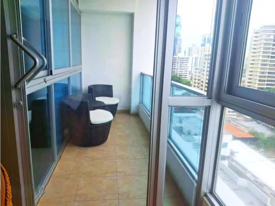 Bright living area with modern furniture and ocean skyline view PH Bayfront Panama