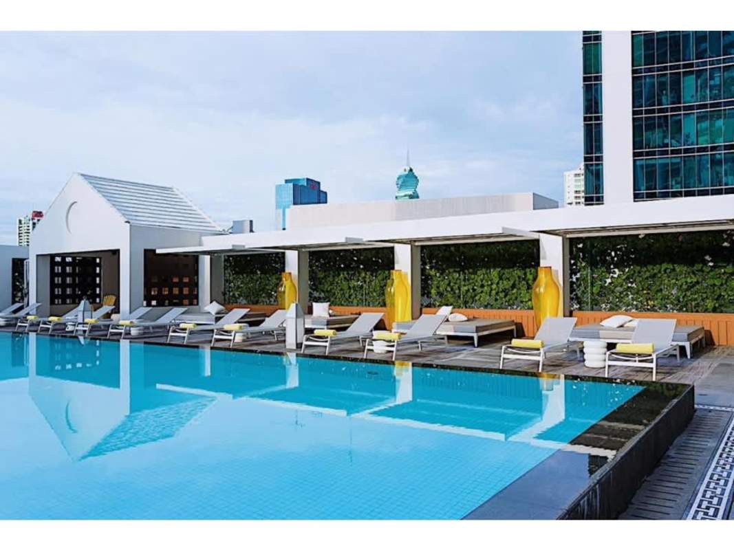 Modern double-height lobby with designer furnishings in PH Yoo Panama