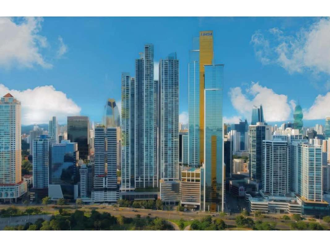 Modern kitchen with stainless appliances and dining area at PH Yoo Panama