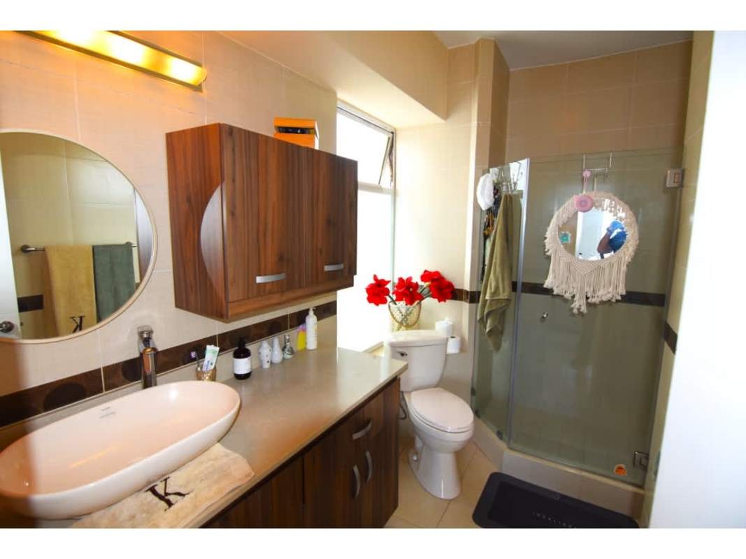 Modern renovated kitchen with marble splashback and appliances PH Vista del Mar Panama