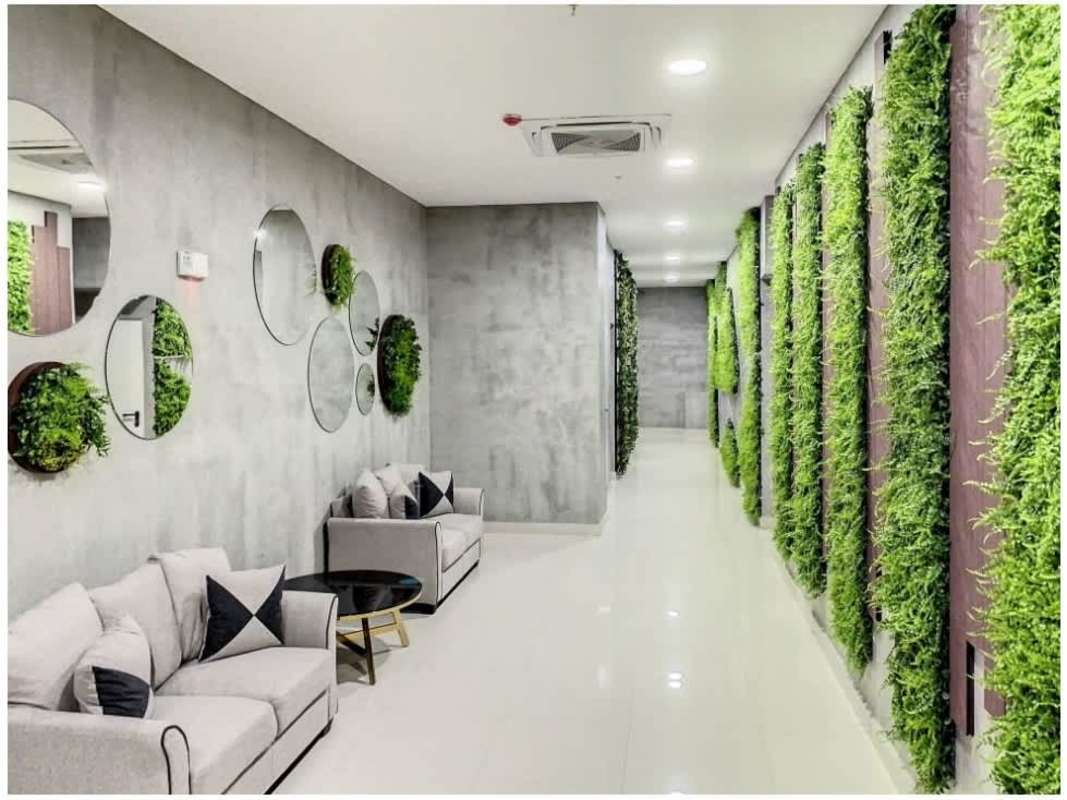 Modern lobby with vertical garden and seating area at PH Botánico, Bella Vista Panama