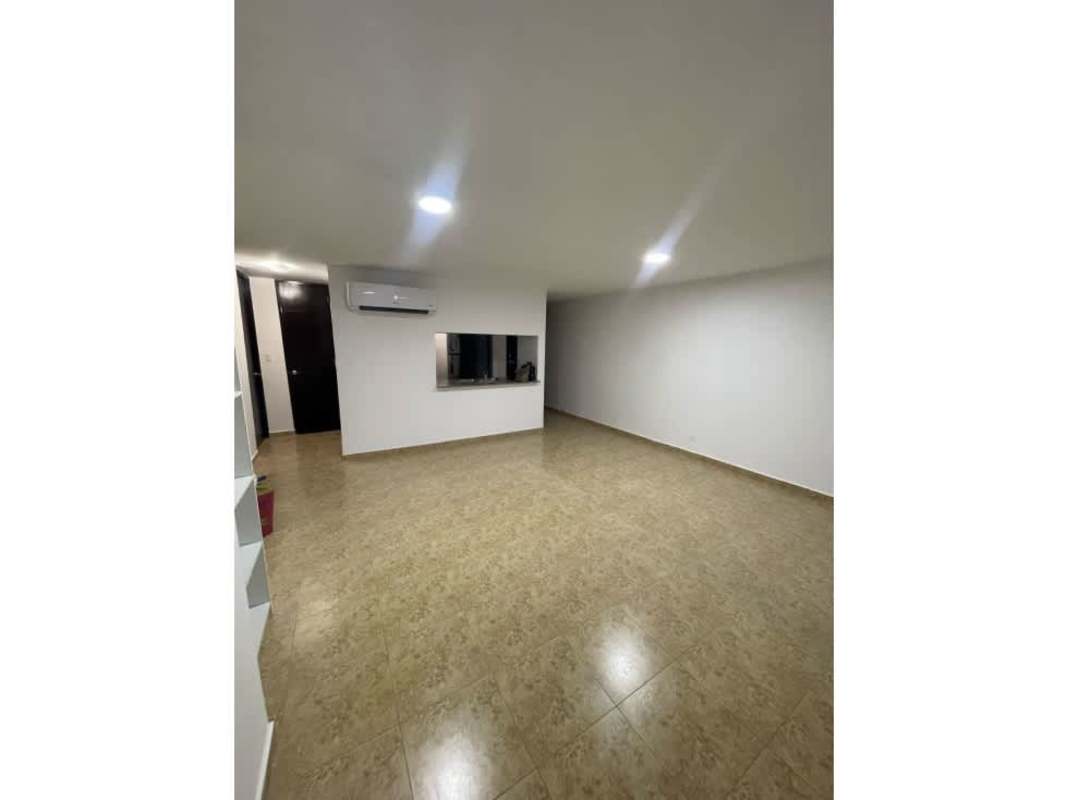 Sky lounge rooftop terrace with synthetic grass and city skyline PH Cosmopolitan Towers