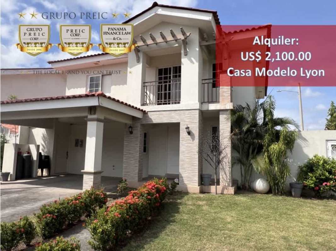 Modern open kitchen with wood cabinets, granite countertops, stainless appliances in Lyon Model Reserva de Versalles Panama