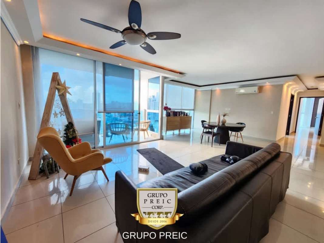 Bedroom with large windows offering city skyline view in PH Waterfalls San Francisco Panama