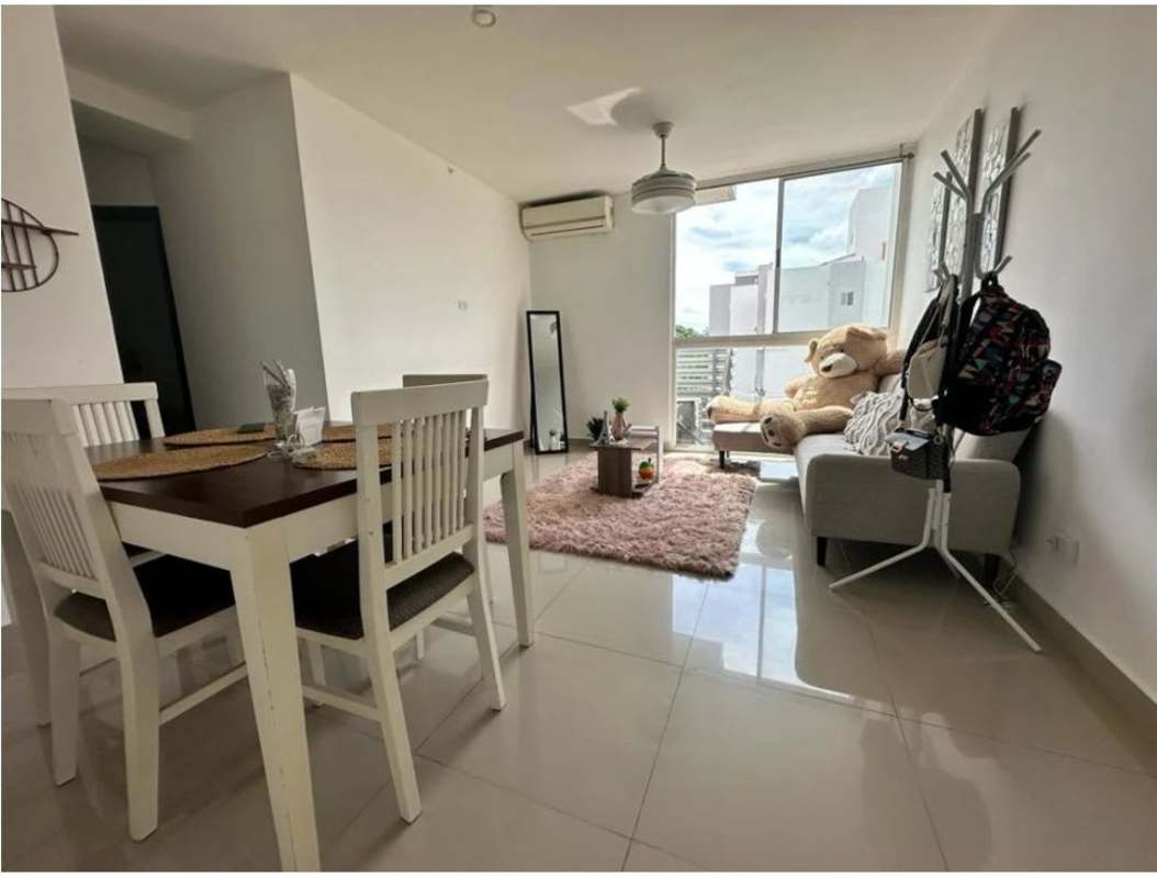 Bright open concept living dining room with balcony access in PH Perejil Tower Panama City