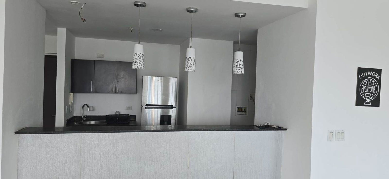 Bright living room with panoramic windows and city skyline views in PH Macedonia Towers El Ingenio Panama