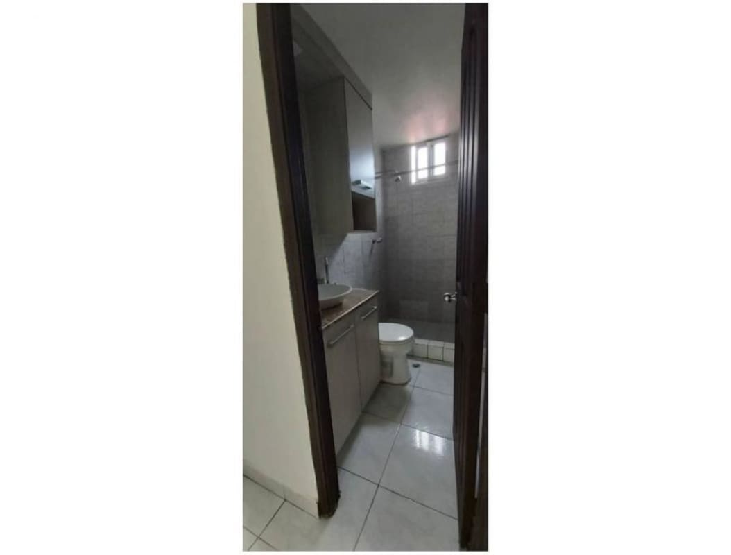 Compact bathroom with granite counter sink, walk-in shower, tiled walls in PH Veracruz Carrasquilla Panama