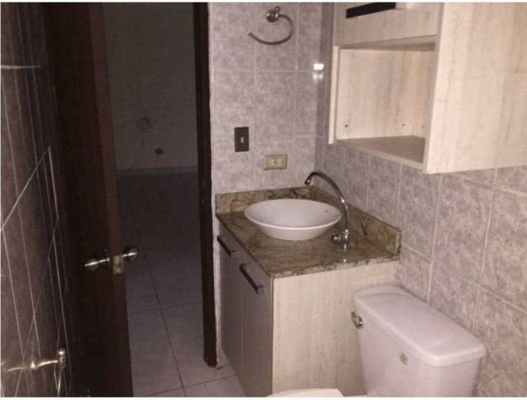 Bathroom interior with granite countertop sink, vessel bowl, tiled walls PH Veracruz Panama