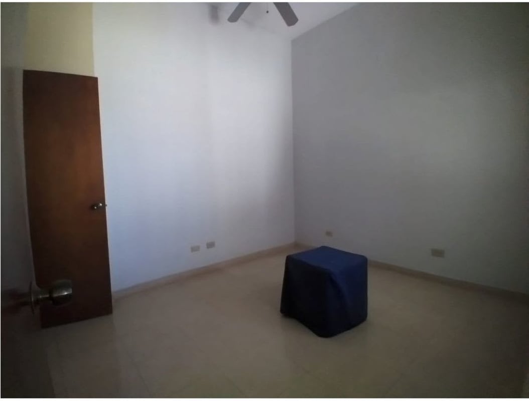 Large covered balcony with railings view of Panama City buildings investment opportunity