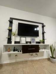 Contemporary bathroom glass shower pedestal sink white ceramic tiles Panama rental