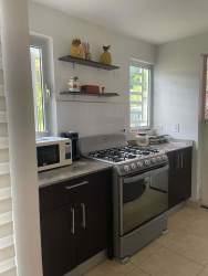 Bedroom with wall AC roller blind window bright minimalist style for rent Panama