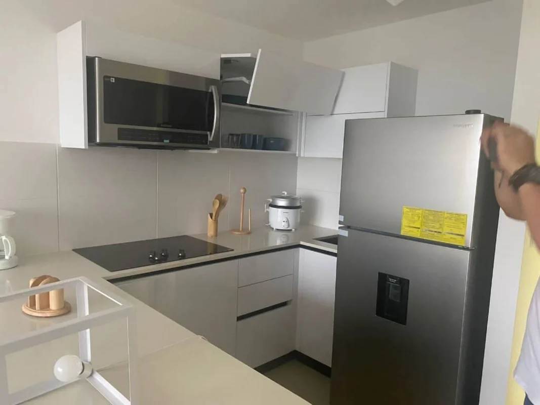 Bedroom with ensuite bathroom, air conditioning, closet, city view window in PH San Francisco Bay Panama