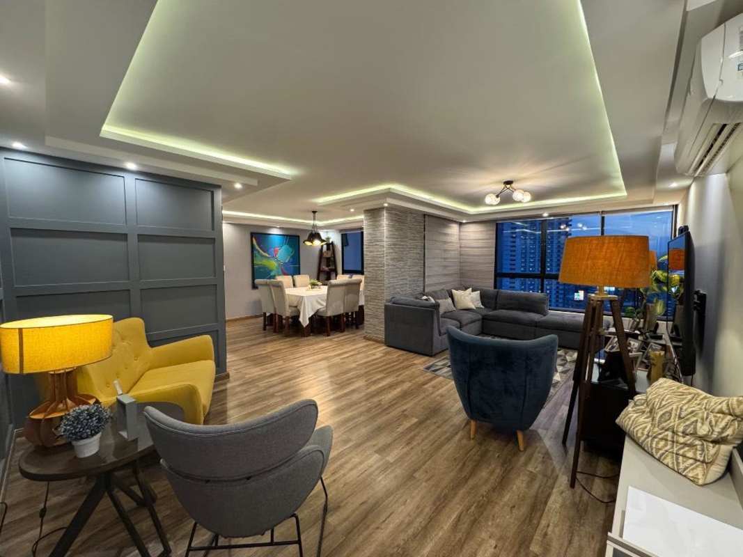 Modern open dining and living room with city views PH Primavera Obarrio Panama City