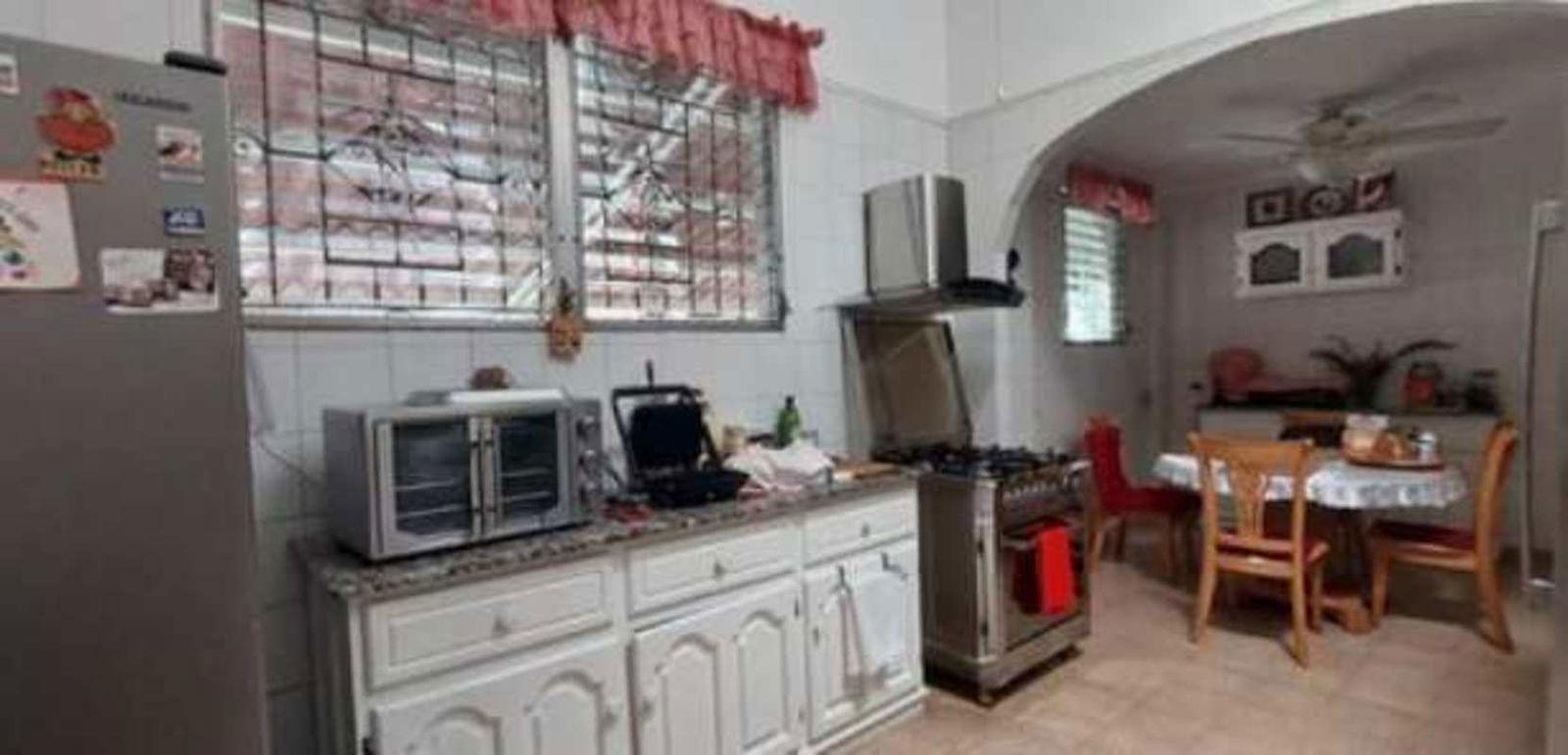 Spacious traditional dining room with chandelier and natural light Betania Panama