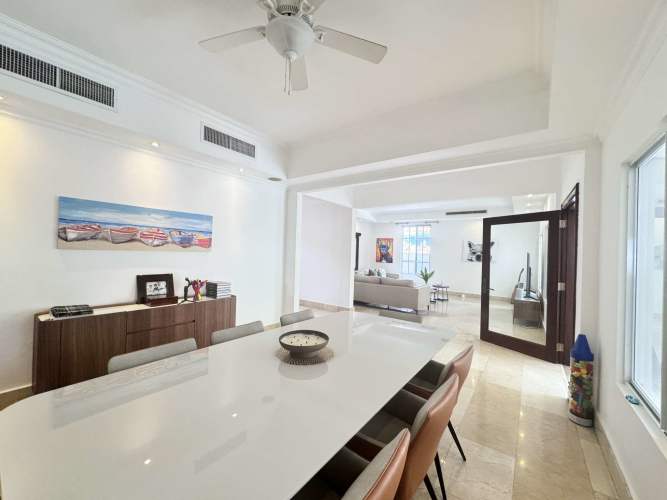 Spacious kitchen with granite countertops, full appliances, and breakfast nook in PH Paramount Costa del Este Panama
