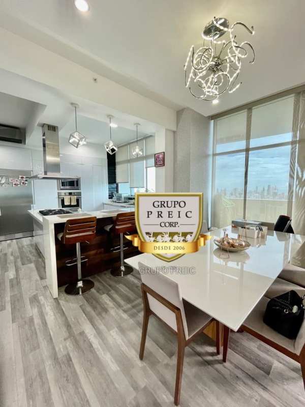 Fully furnished kitchen with island, appliances and city view at PH Elite 500 Panama City