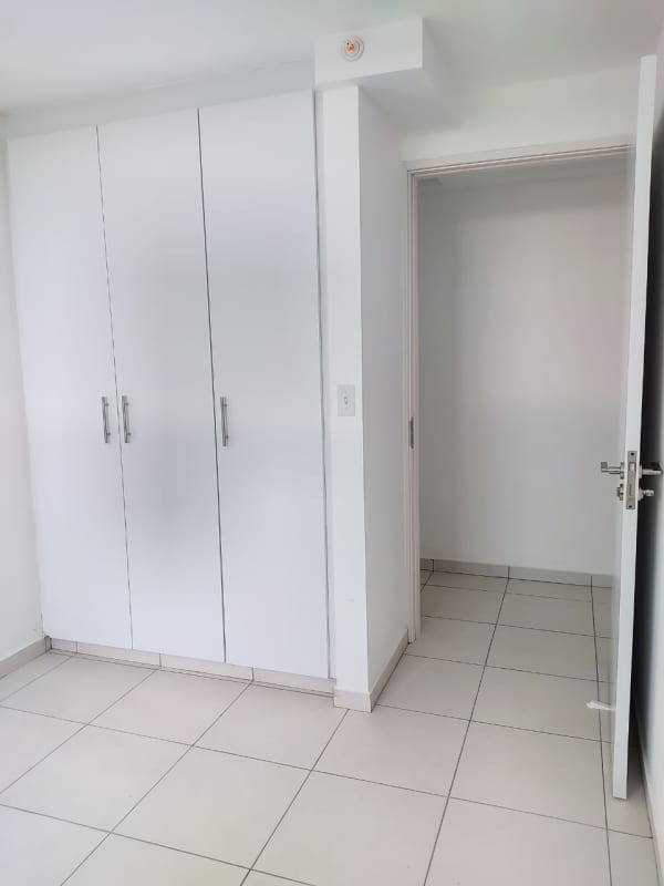 Bedroom with built-in wardrobe and window PH Mystic Valley Panama