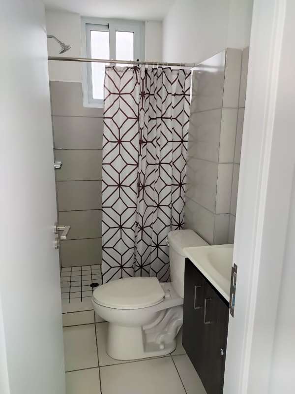 Compact bathroom with modern tiles and shower in PH Mystic Valley El Crisol Panama