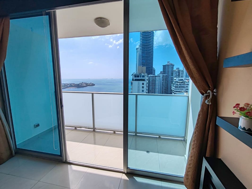 Large bright living room with ocean view balcony in PH Punta Paitilla Panama City