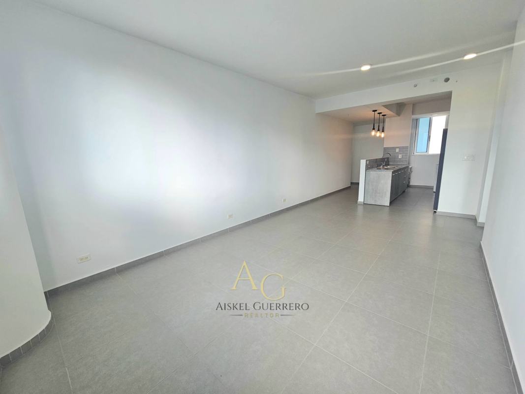 Modern bedroom with built-in closet, window city skyline view in Signature Point Panama City