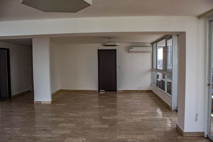 Wrap-around balcony with Pacific Ocean and skyline views from luxury apartment at The Point Tower Punta Paitilla