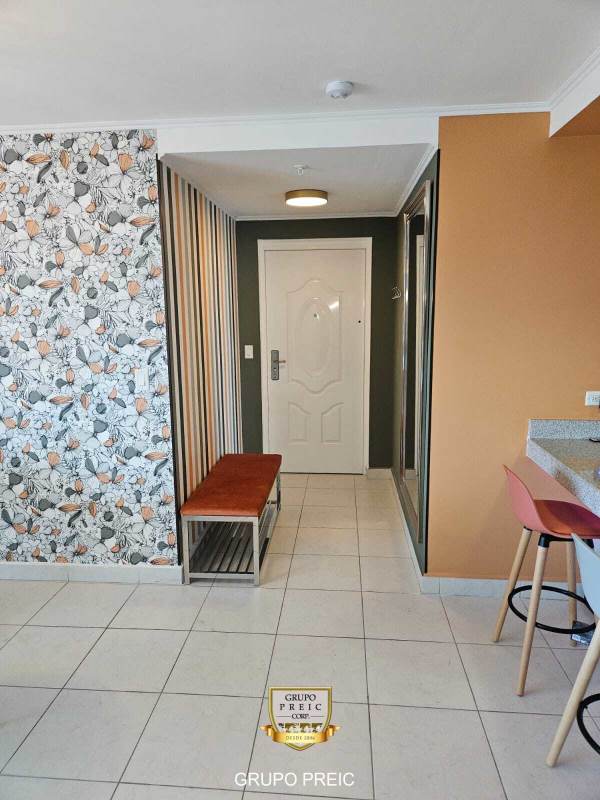 Spacious living room with large windows and balcony PH Miro El Cangrejo Panama City