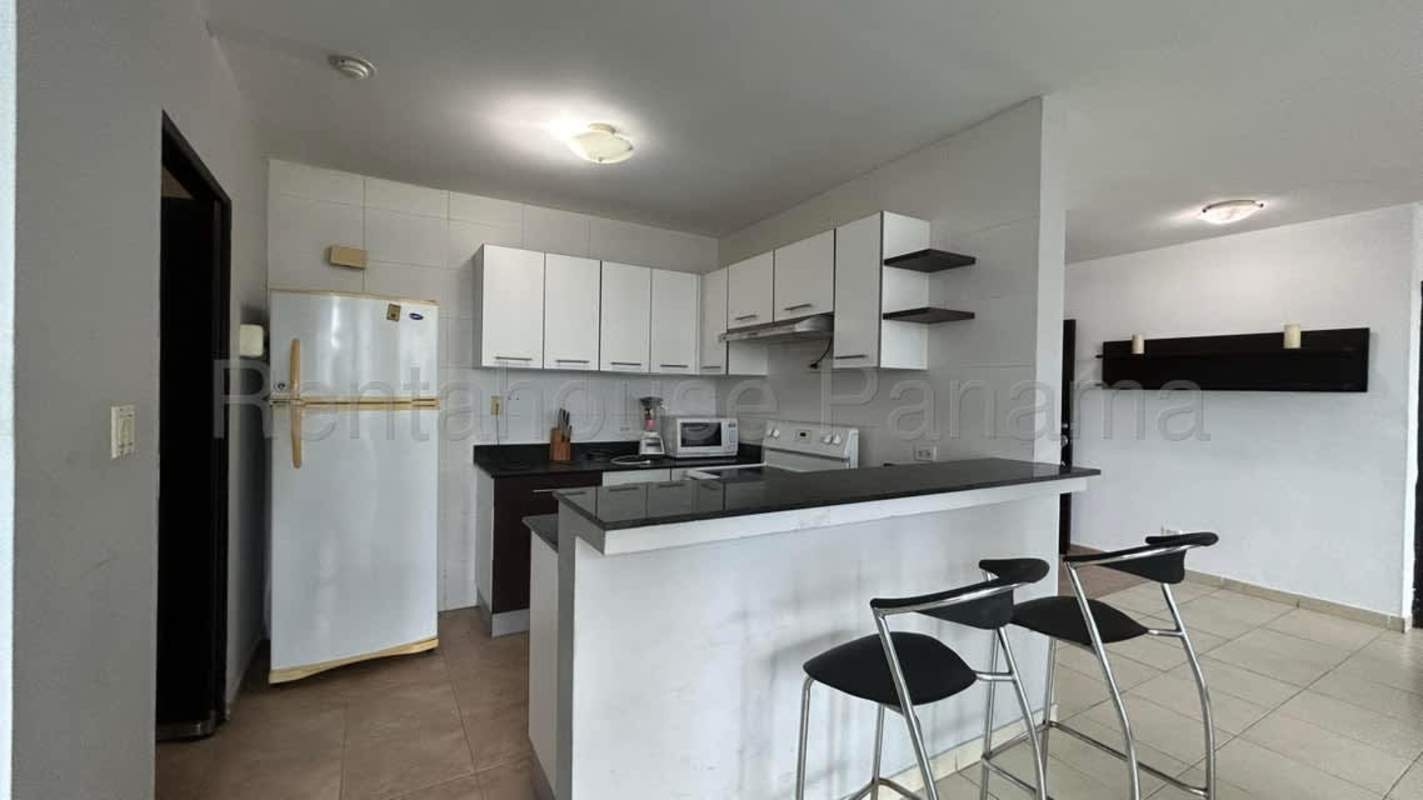Kitchen with breakfast bar and dining area with tile flooring at Bayfront Tower Panama