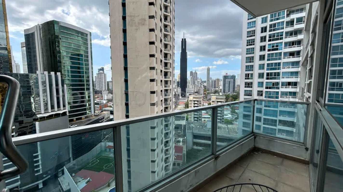 Modern bedroom with large windows showcasing ocean view at Bayfront Tower Avenida Balboa