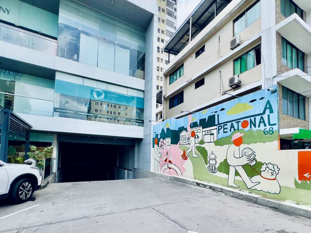Colorful modern facade and street view of San Francisco Business Plaza Panama City