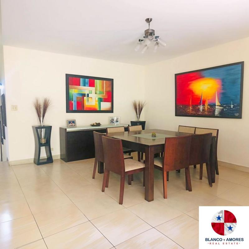 Covered patio with garden, tiled floors and outdoor dining space Ancon house Panama