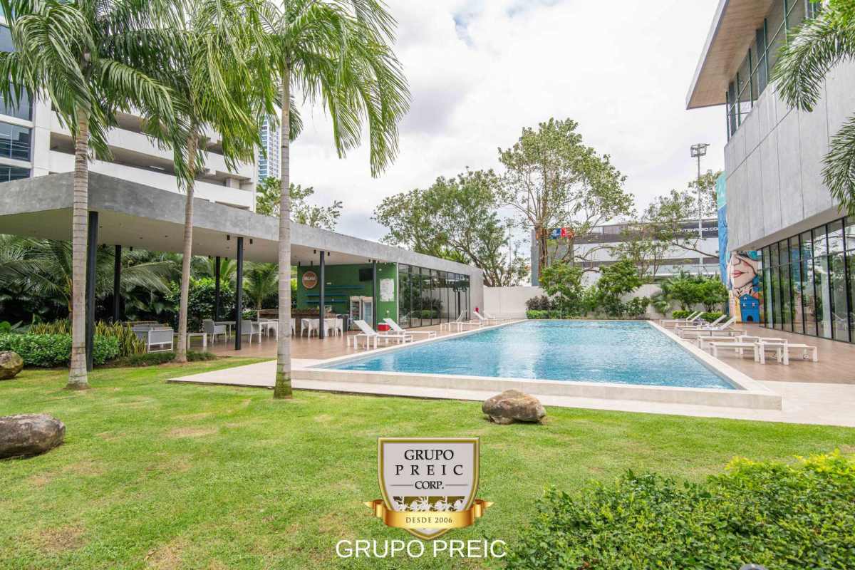 Modern master bedroom with large mirror and ensuite bathroom at The Regent in Costa del Este
