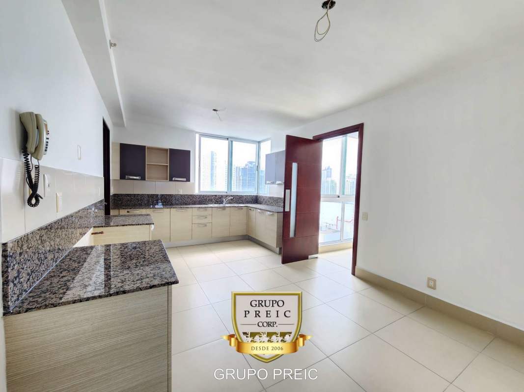 Gourmet kitchen with granite countertops and city view in PH Breeze Costa del Este Panama