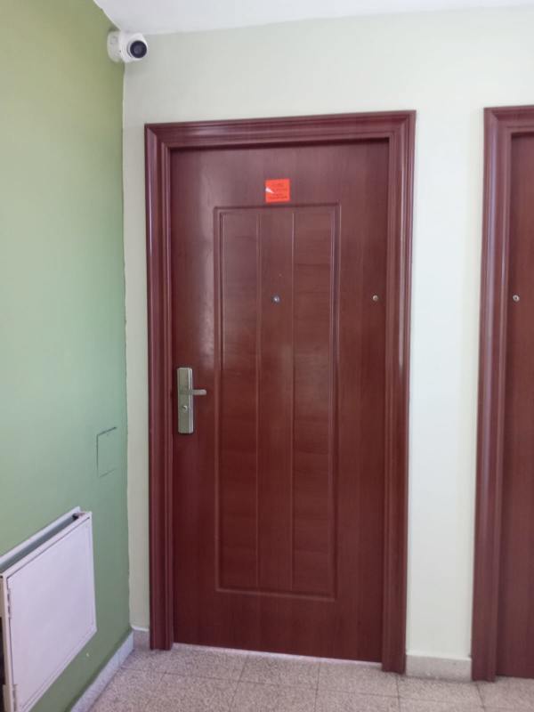 Entry hallway with wooden door electronic lock security camera PH Santa Elena Chanis Panama