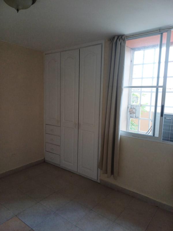 Second bedroom with closet and tiled floors Terrazas San Francisco Panama