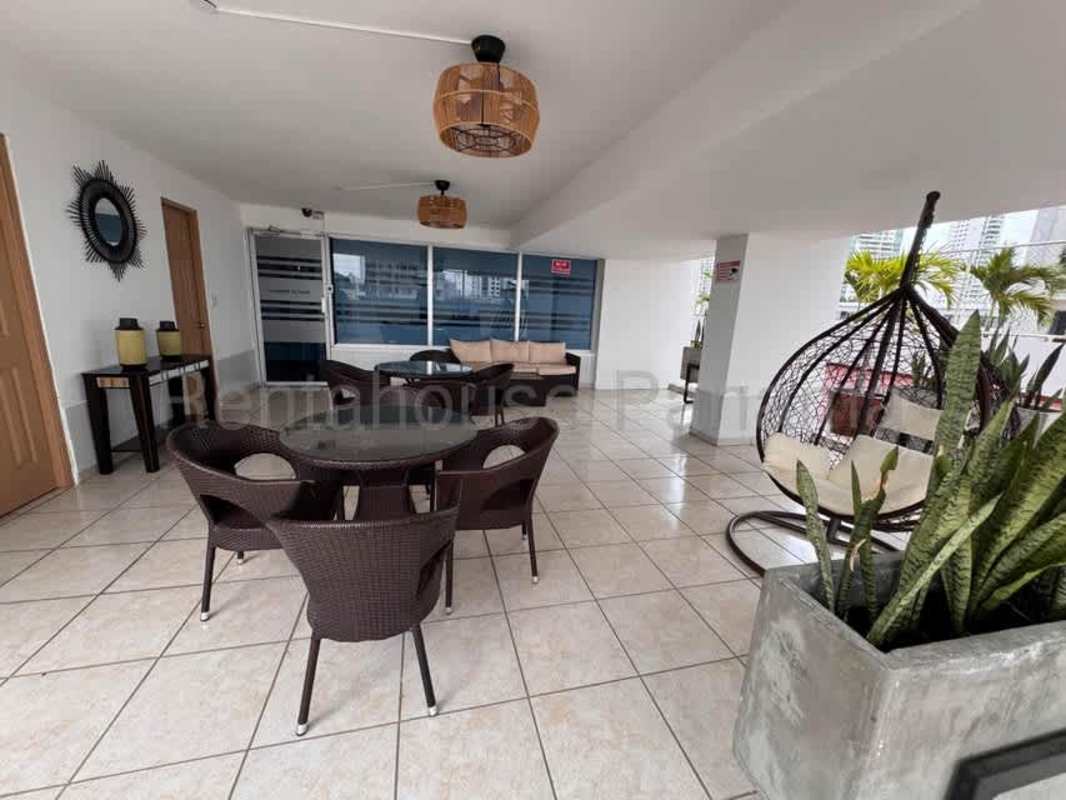 Outdoor swimming pool with sun deck at PH Via España Residences Obarrio Panama City