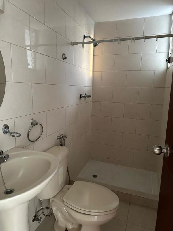 Kitchen with granite counters refrigerator gas stove PH Central Park Tower Tribeca Panama