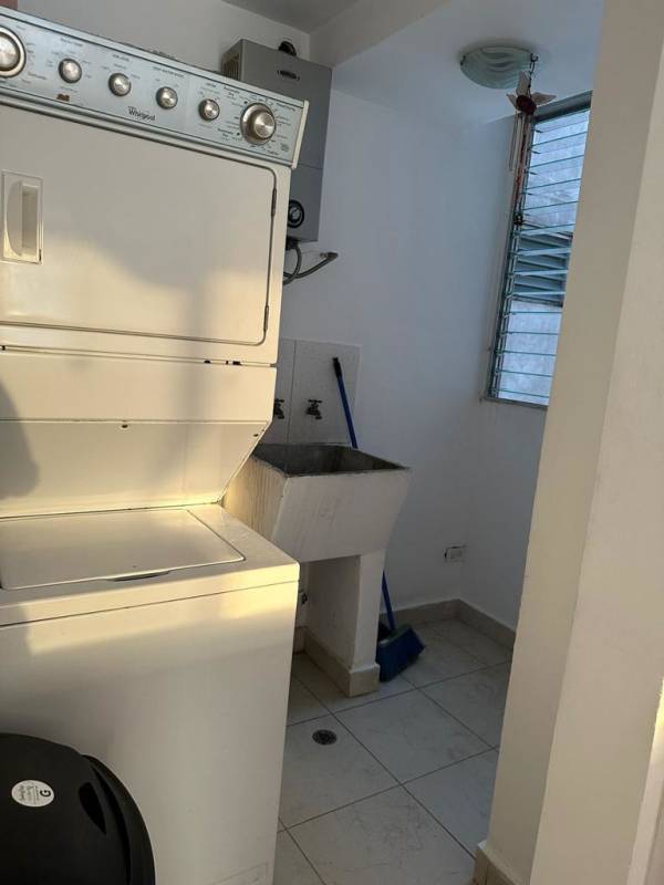 Laundry area with washer dryer hookups ceramic tile PH Central Park Tribeca Panama