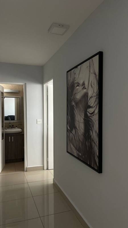 Furnished bedroom with built-in closet, AC unit, large window PH San Francisco Bay Panama