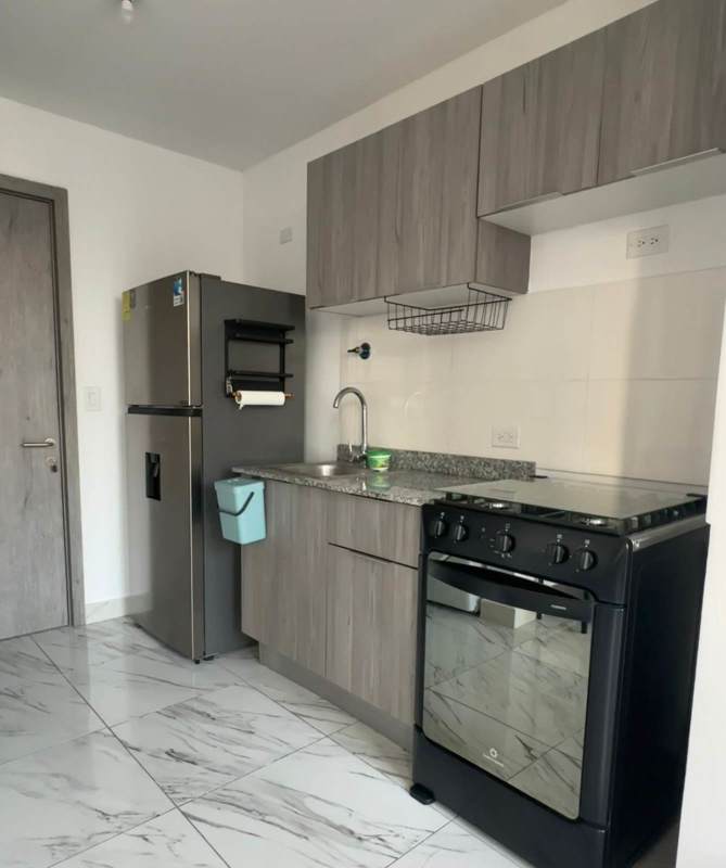 Contemporary kitchen with granite counters and stainless appliances in PH Mirador 50 Obarrio Panama City