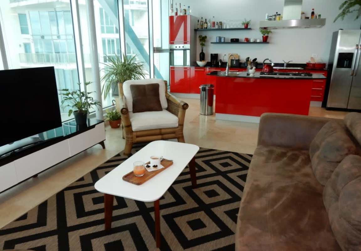 Open kitchen with island and ocean view in PH Four 41 Panama City