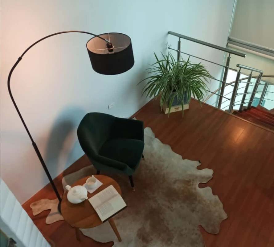 Loft master bedroom with floor-to-ceiling windows and ocean view Panama City