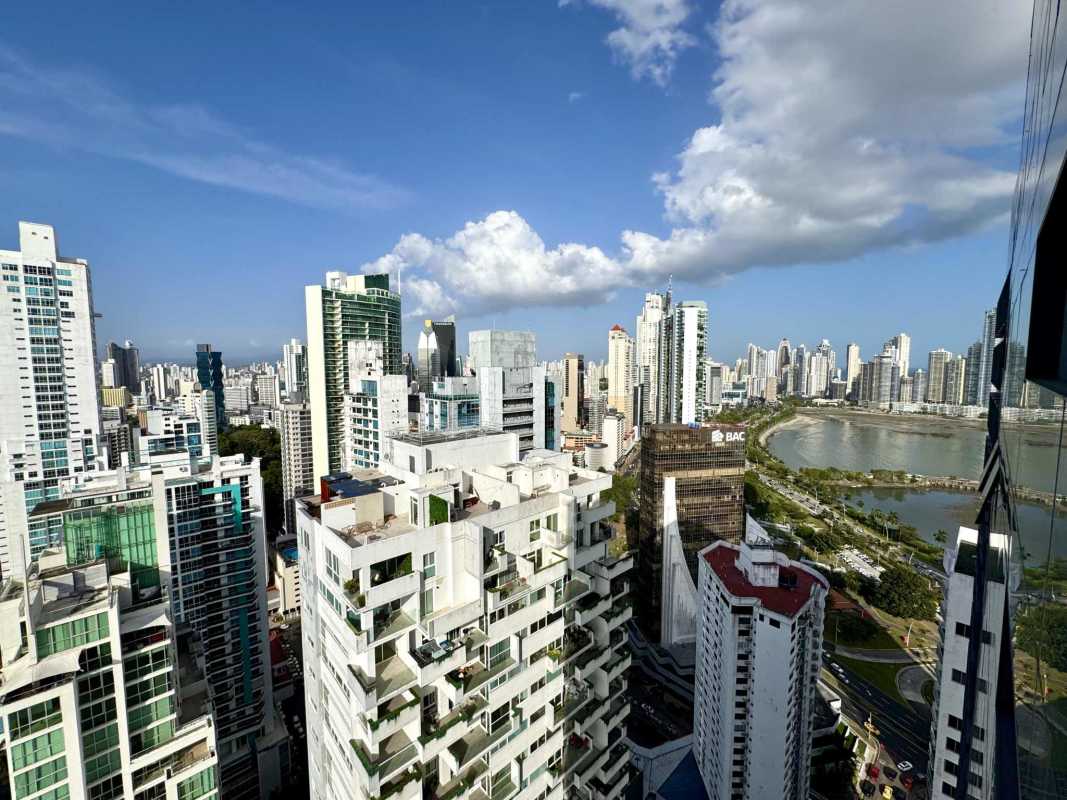 Aerial view of high-rise buildings, waterfront and Avenida Balboa skyline near Nuovo by Armani Casa