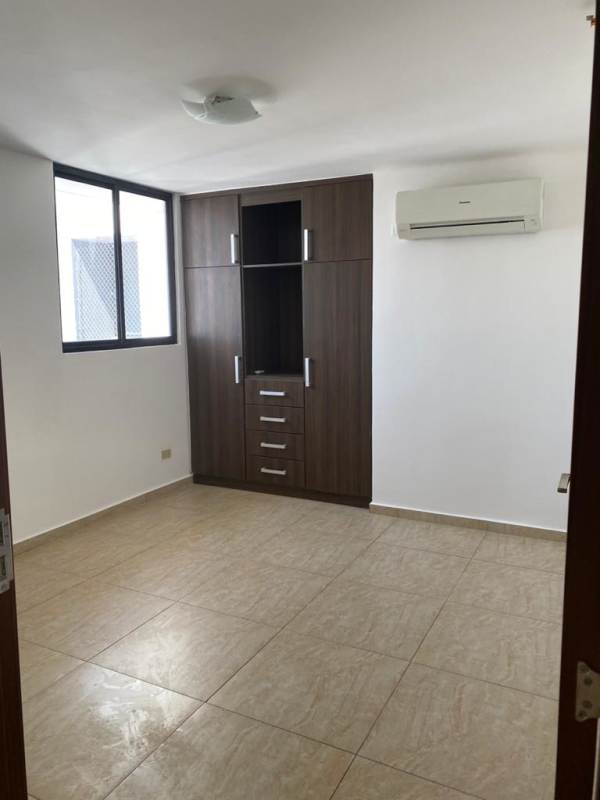 Bedroom with built-in closet, tile floors, natural light, Condado del Rey Panama