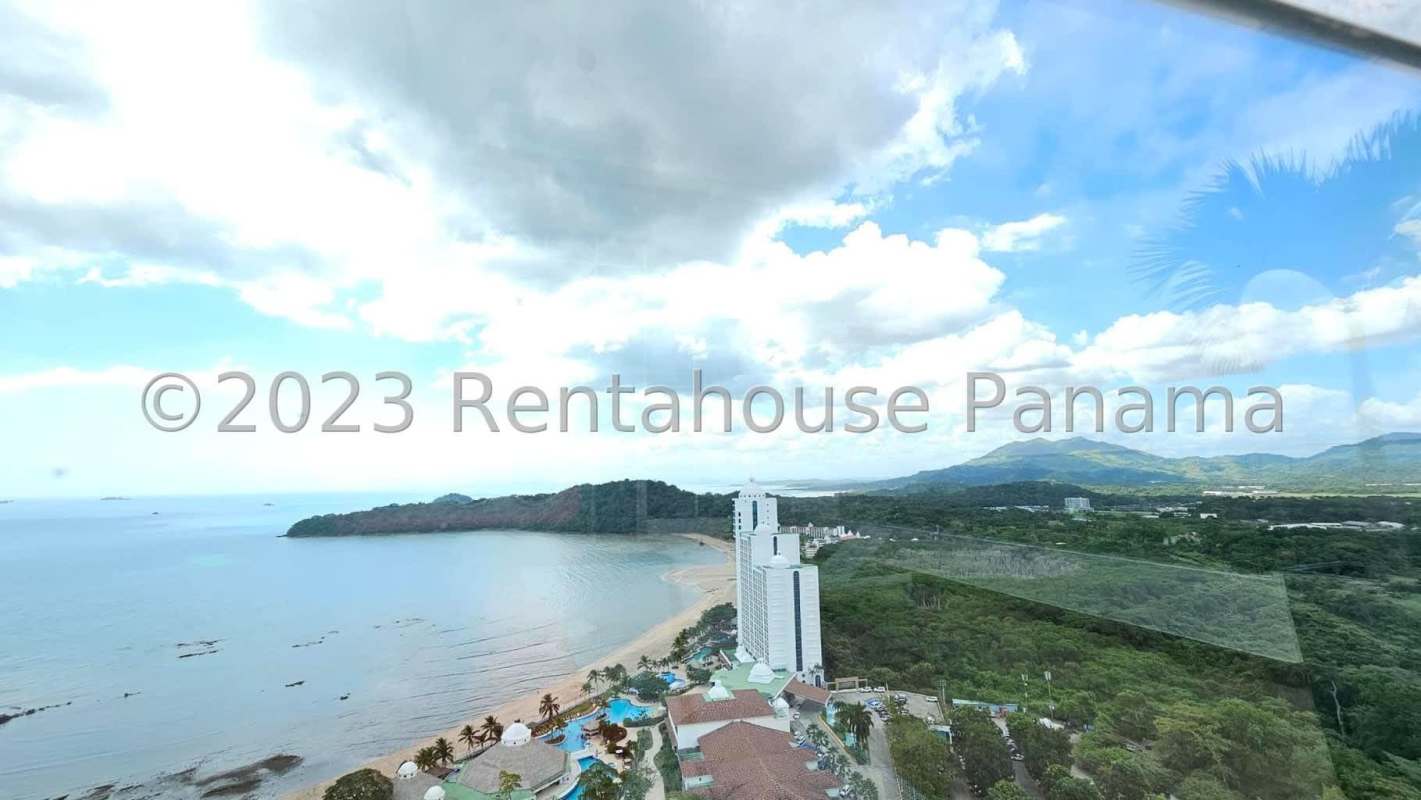 Modern open living-dining room with marble floors balcony access ocean views Casa Bonita Playa Bonita Panama