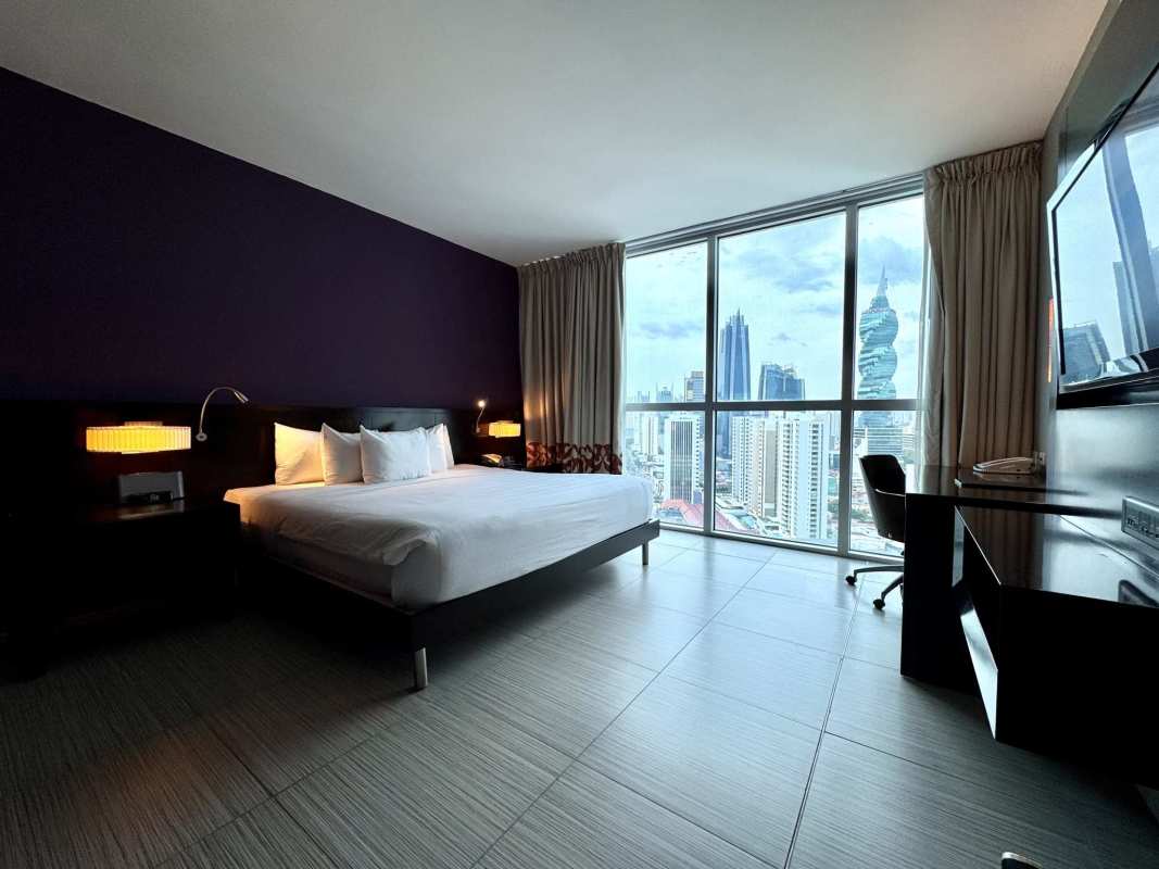 Rooftop infinity swimming pool overlooking Panama skyline at Megapolis Tower